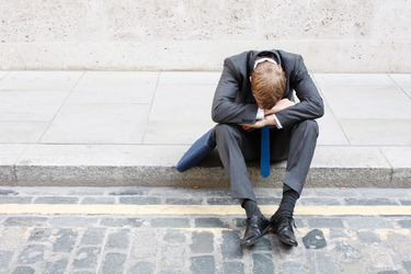 man with his head down man with his head down