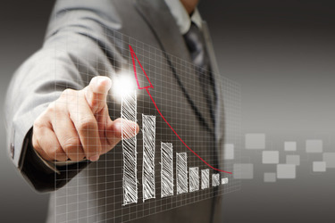 man pointing to rising graph man pointing to rising graph